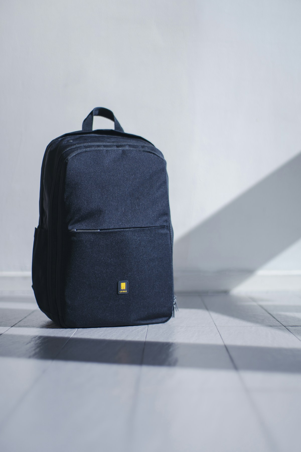 Premium men's leather backpack and briefcase — editorial fashion